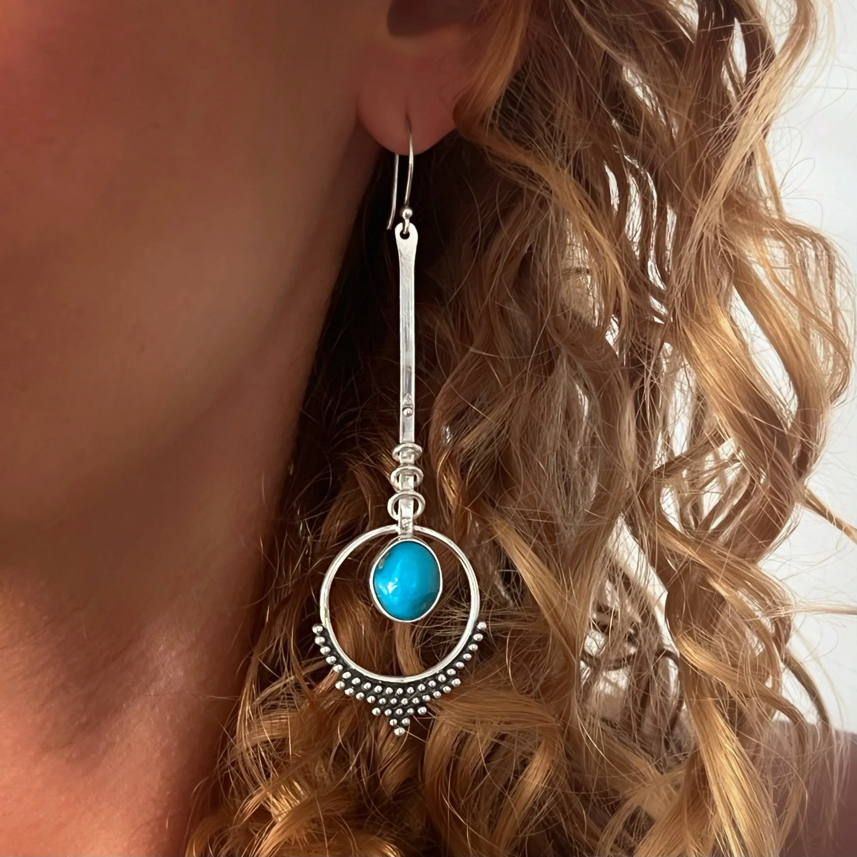 Turquoise pendulum earrings in silver